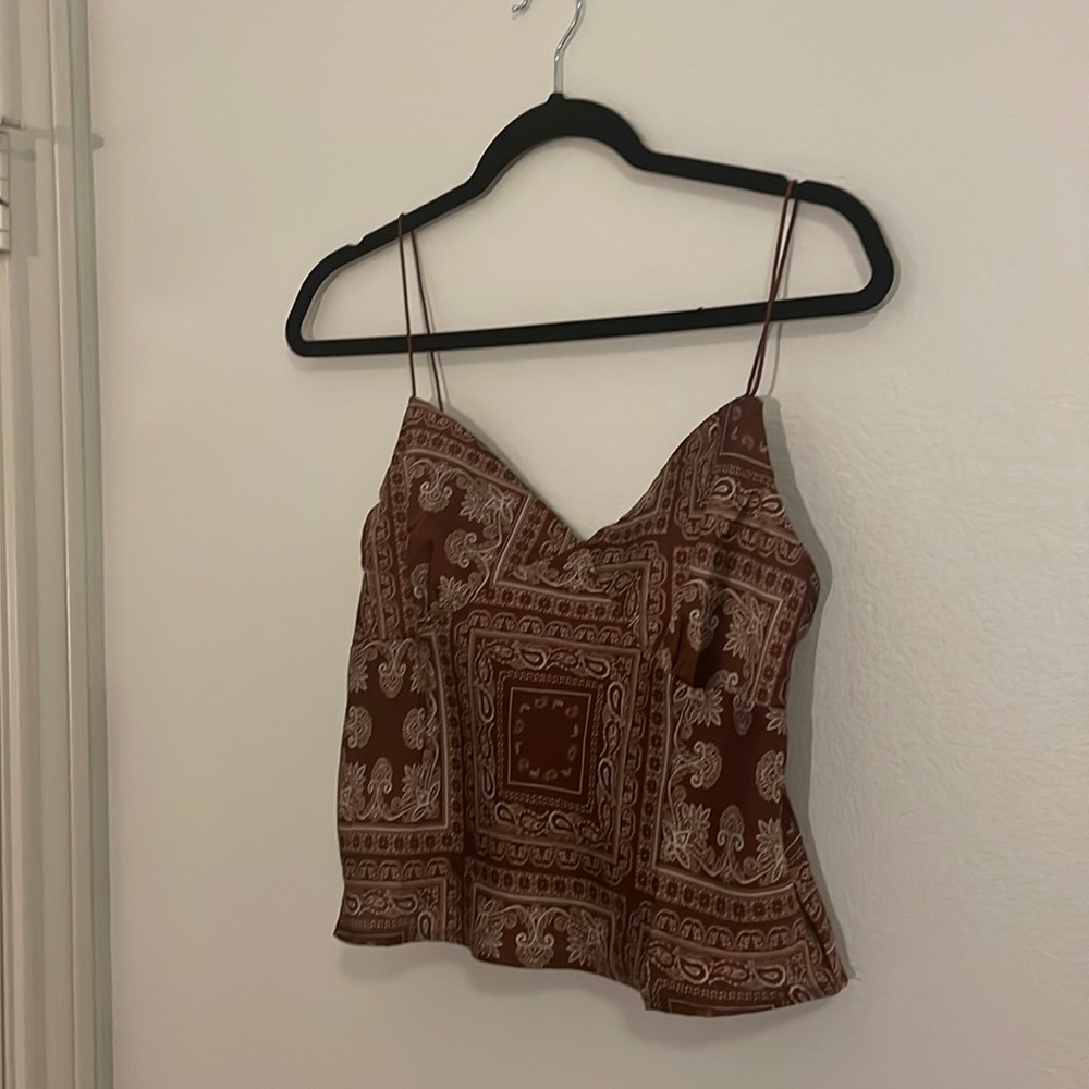 A bandana styled top satan type top,flowy brown and white detail